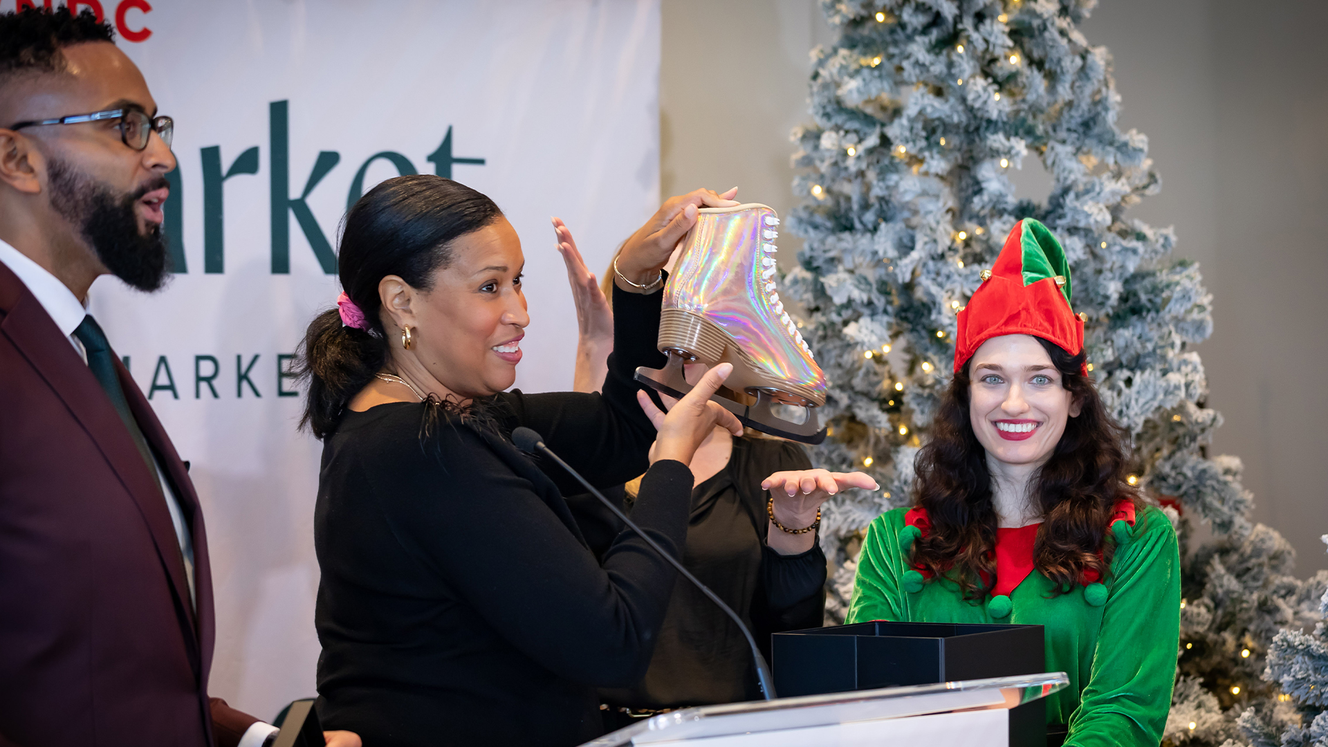 Mayor Bowser revealing the DowntownDC Holiday Skate Spectacular